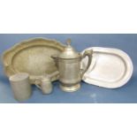 A collection of pewter ware including a large coffee pot, tea canister, milk jug, two trays,