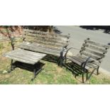 A vintage sprung steel garden bench with weathered timber lathes, 150cm wide, together with a