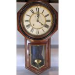 A late 19th century American drop dial wall clock, with eight day striking movement