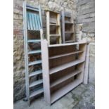 A vintage pine open bookcase/shelving unit with shaped brackets and overpainted finish, 122cm wide x