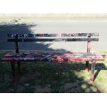 A painted metal park or municipal bench with slatted seat and back rails, 180cm wide x 85cm high