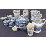 A collection of 19th century blue and white ceramics including two water jugs and a tankard with