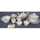 A collection of 19th century blue and white floral pattern tea wares (possibly Rockingham) with gilt