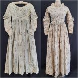 19th century Victorian day dress in printed cotton with fitted bodice, long sleeves, skirt