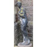 A large painted and weathered garden statue "Pandora", 156cm high (af) set in concrete, 165cm high