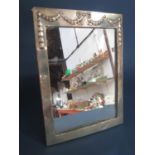 A silver photo frame with swag and garland decoration, Birmingham 1905, makers mark rubbed, 8.5 x