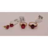 Group of 9ct ruby set jewellery comprising two rings and a pair of stud earrings, 8.1g total,
