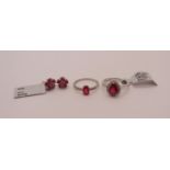 Group of ruby set jewellery comprising two 9ct white gold rings also set with diamonds, both size