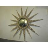 A sunburst convex mirror with shell encrusted frame, 95cm diameter