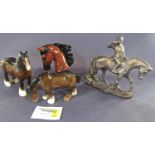 Two Beswick pottery shire horse figures, a bronzed ceramic figure of a huntsman on horseback, a