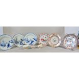 A collection of 19th century Chinese export ware comprising various plates in a blue and white and