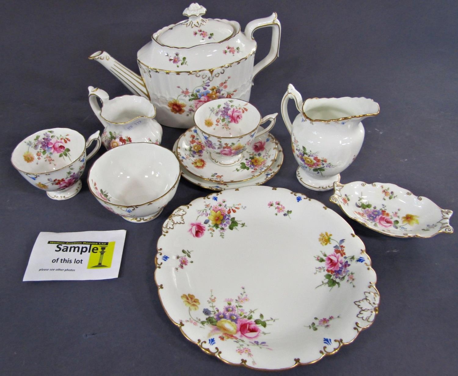 A collection of Royal Crown Derby tea wares comprising teapot, sugar bowl, milk jug, cream jug, cake