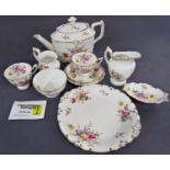 A collection of Royal Crown Derby tea wares comprising teapot, sugar bowl, milk jug, cream jug, cake