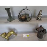 A miscellaneous collection of items including a vintage blow torch, a steel policeman money box, a