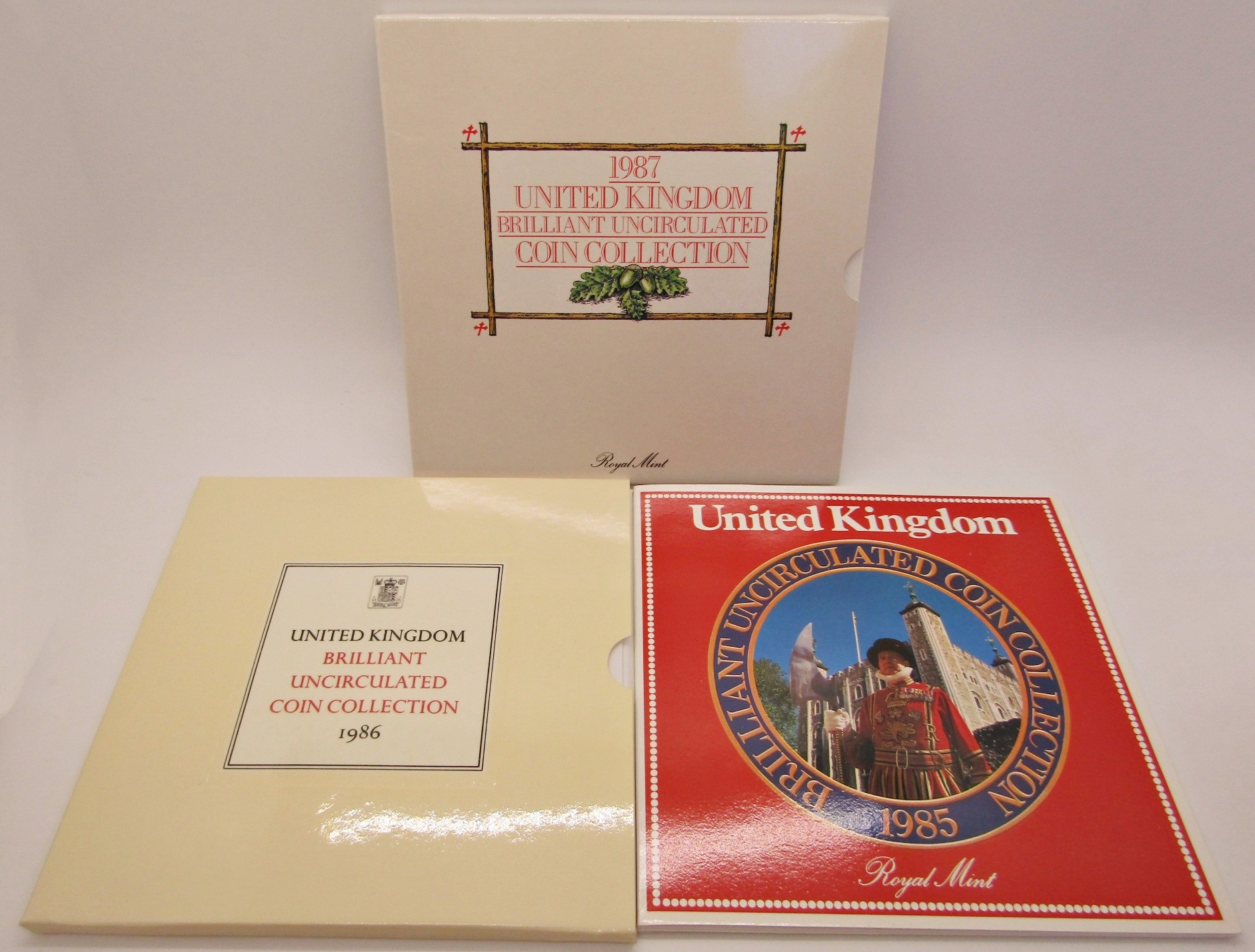 UK Brilliant uncirculated coin collections - 1982 x 2, 1983 x 3, 1984, 1985, 1986, 1987 - £1 - ½p