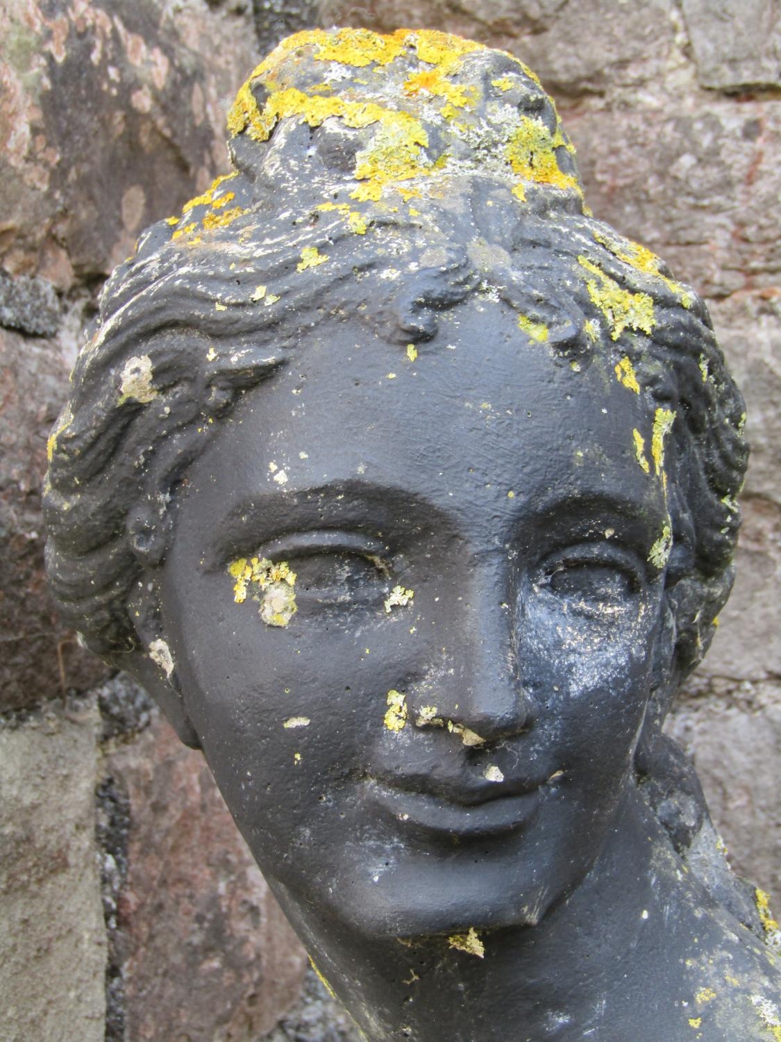 A large painted and weathered garden statue "Pandora", 156cm high (af) set in concrete, 165cm high - Image 2 of 2
