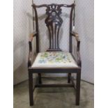 A good quality Edwardian mahogany open elbow chair in the Georgian manner with pierced and