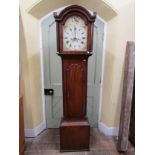 A Georgian mahogany longcase clock, with reeded and canted corners, arched hood, enclosing a