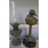 A collection of four 19th century brass oil lamps of varying shapes and sizes (as found)