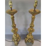 A pair of gold finished Neo Classical style table lamps, 64cm high including fitting