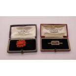 Victorian yellow metal brooch set with carved coral, together with a further mourning brooch with