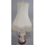 A pair of table lamps in the Mason's Mandalay pattern, 26cm tall approx, together with a further