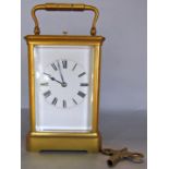 A 19th century English carriage clock with eight day striking movement and repeat action, with