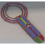 A South African brightly coloured beaded necklace. 14cm diam x 28cm.