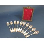 Ten matching Victorian teaspoons, various makers and a silver scrolled photo frame (af) 6.4oz approx