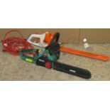 A Stihl HSE 42 electric hedge trimmer, together with a Qualcast 2000 watt electric chain saw, a