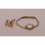 Vintage 9ct brooch set with pearls and diamonds, 5.3g, together with a Porta gold plated watch