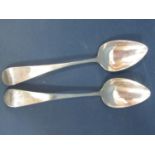 A pair of Georgian silver serving spoons, London 1807, makers mark rubbed, 23cm long, 4.2oz approx