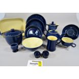 A collection of Denby table wares in a blue colourway comprising dishes, bowls, teapot, milk jug,