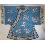 Early 20th century Chinese/ oriental silk robe, unlined, with blue ground embroidered with floral