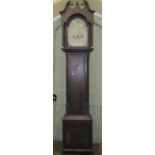 A Georgian oak longcase clock, the trunk with full length door and reeded and canted corners, the