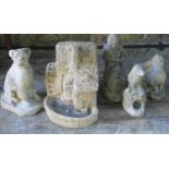 Five small weathered cast composition stone garden ornaments in the form of a water powered mill,