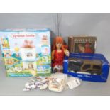 Mixed toy lot including Sylvanian Families 'Primrose Baby Windmill' (unchecked), wooden puppet in