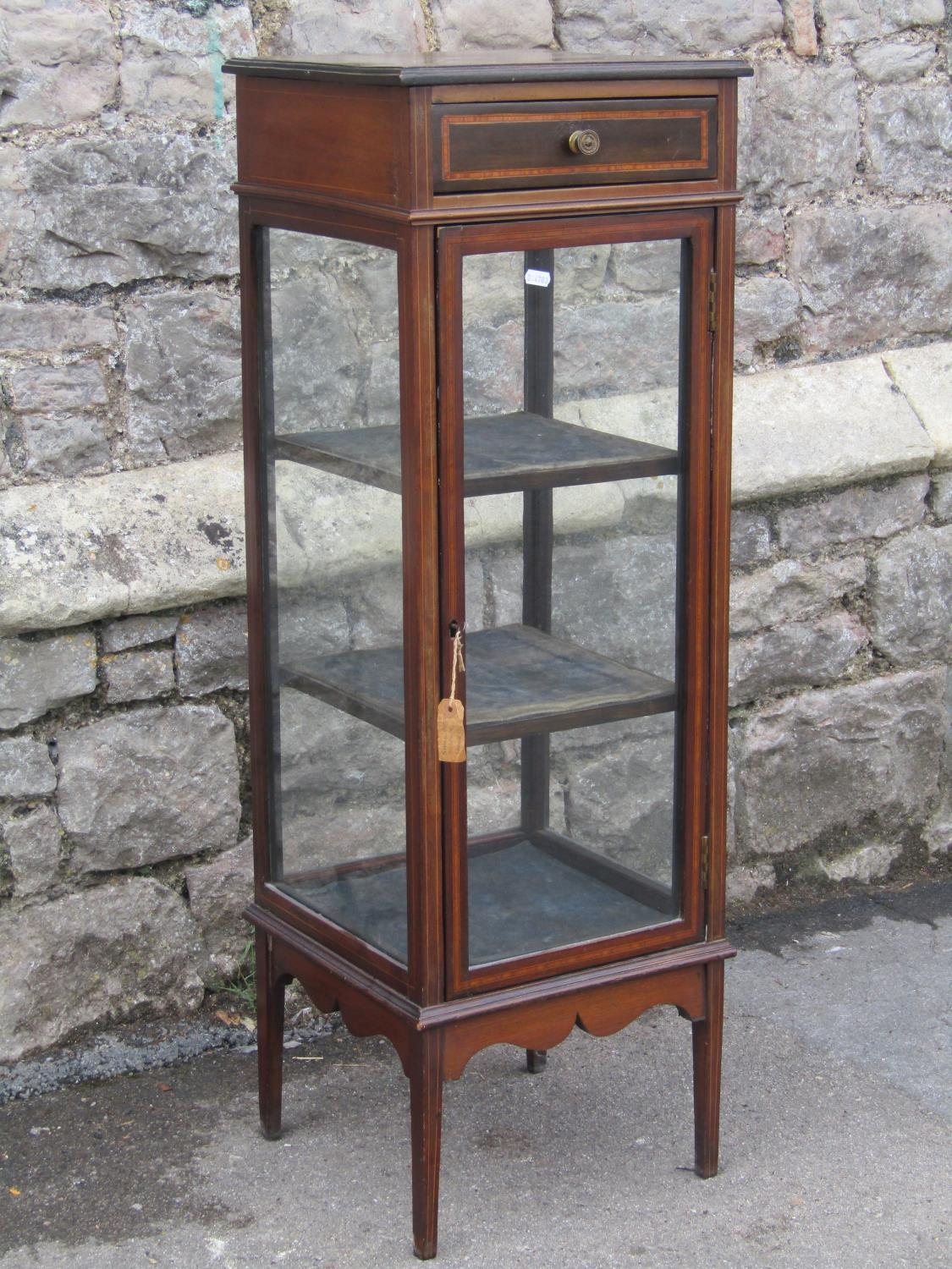 An inlaid Edwardian mahogany pedestal side cabinet of square cut form with satinwood banding and