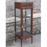 An inlaid Edwardian mahogany pedestal side cabinet of square cut form with satinwood banding and