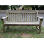 A Barlow Tyrie weathered teak garden bench with slatted seat and back 160 cm wide