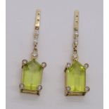 Pair of yellow metal citrine and diamond drop earrings, 4.3cm L approx, 6.1g (hooks / studs absent)