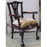 A reproduction dolls size Chippendale design open armchair with upholstered drop in seat, raised