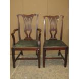 A set of eight (6&2) Edwardian mahogany dining chairs in the Georgian style with pierced splats,