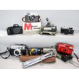 Photographic equipment including a Canon EOS 1000F (no Lens) a Minolta Rokkor Easy Flash, a