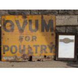 A vintage enamel sign of rectangular form advertising Ovum For Poultry, yellow ground with black