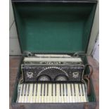 A vintage Galanti piano accordion with pearlised and diamanté body and keys, with it’s case.