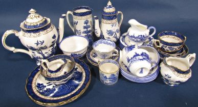 A collection of blue and white tableware including Royal Doulton Real Old Willow graduated coffee