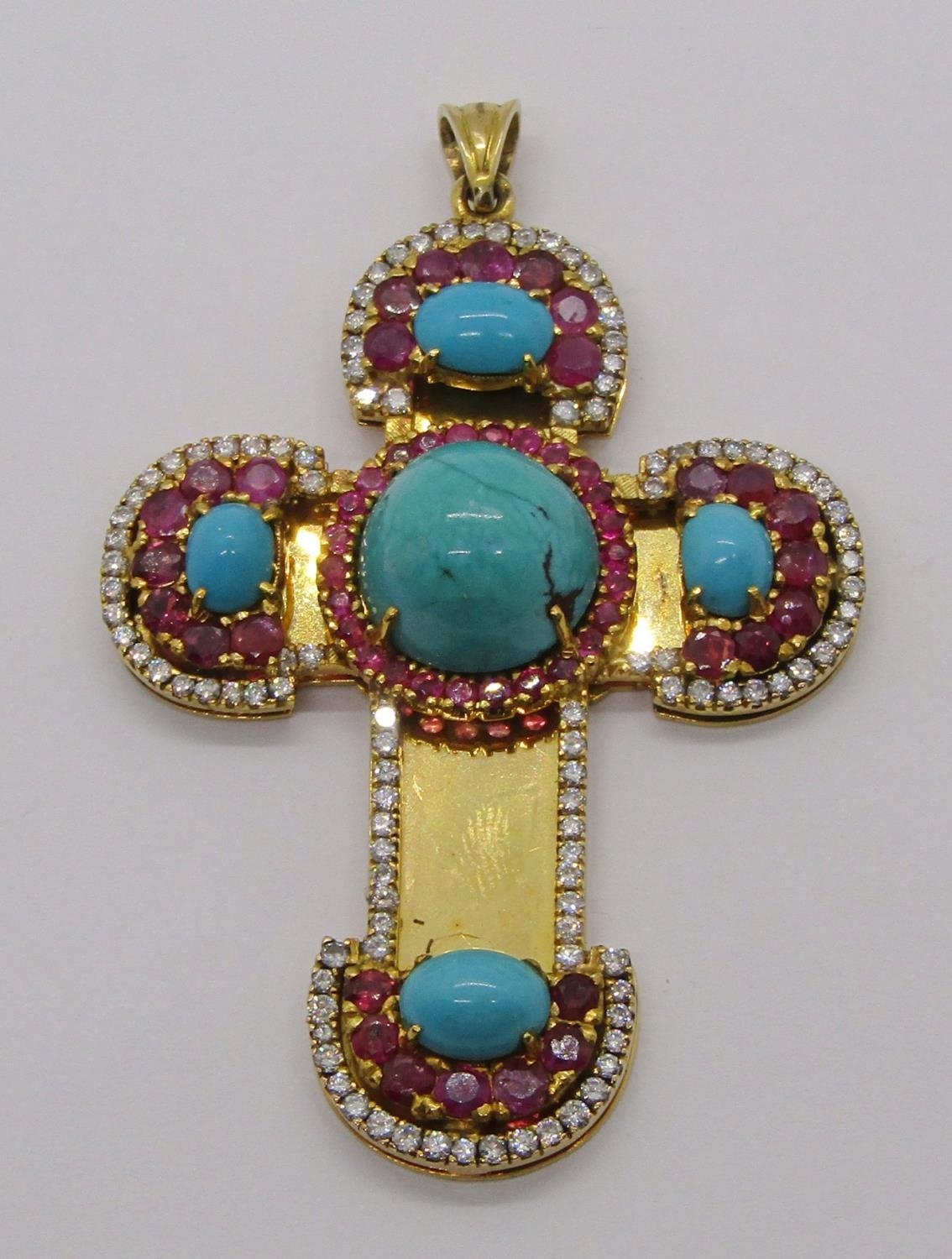 Ornate yellow metal cross pendant set with cabochon turquoise, rubies and diamonds, 7 x 4.6cm