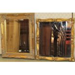 Two small reproduction antique style gilt framed wall mirrors of varying design, with scrolling