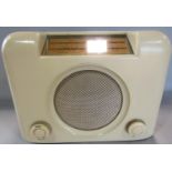 A Bush Radio with two wave lengths Long & Medium, in white plastic casing.